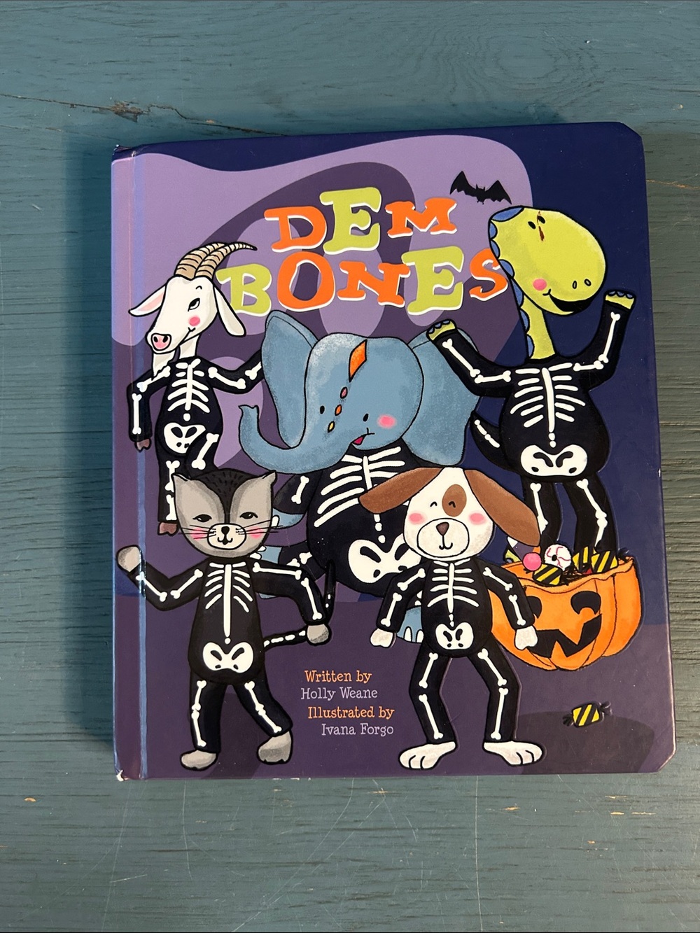 2019 Kids Board Book Dem Bones by: Holly Weane | Skeleton Costume Purple Cover
